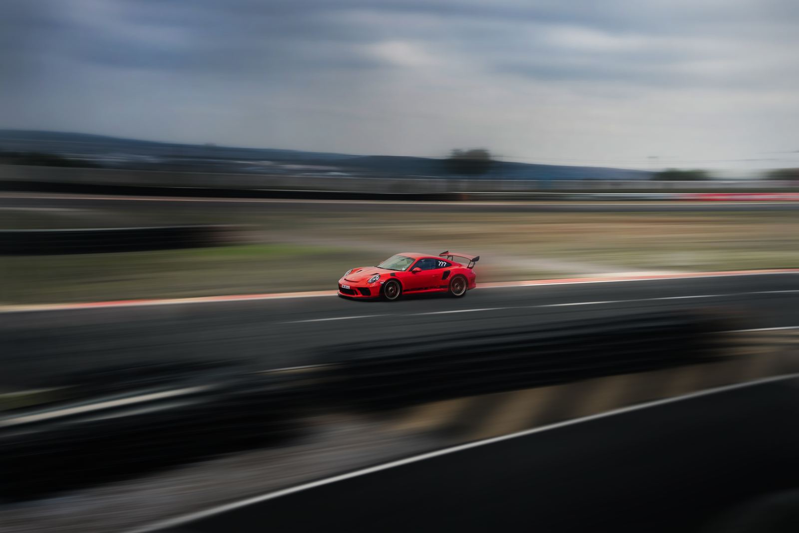 Porsche 911 GT3 RS panned at speed on track at Zwartkops Raceway