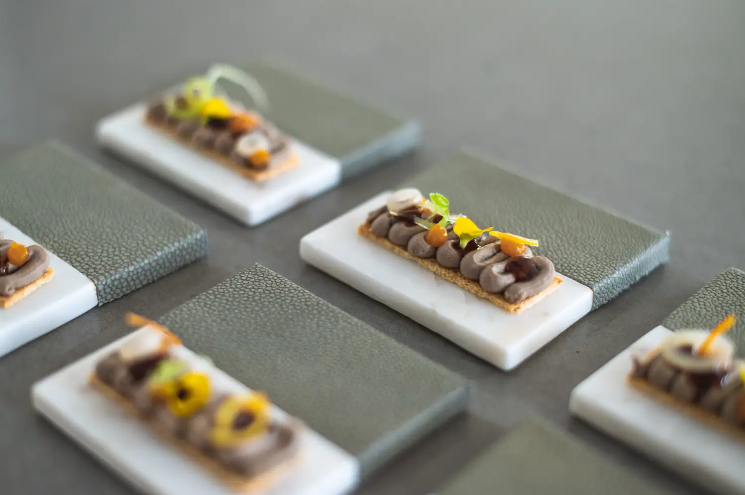 Culture Club — plated courses lined up on the pass