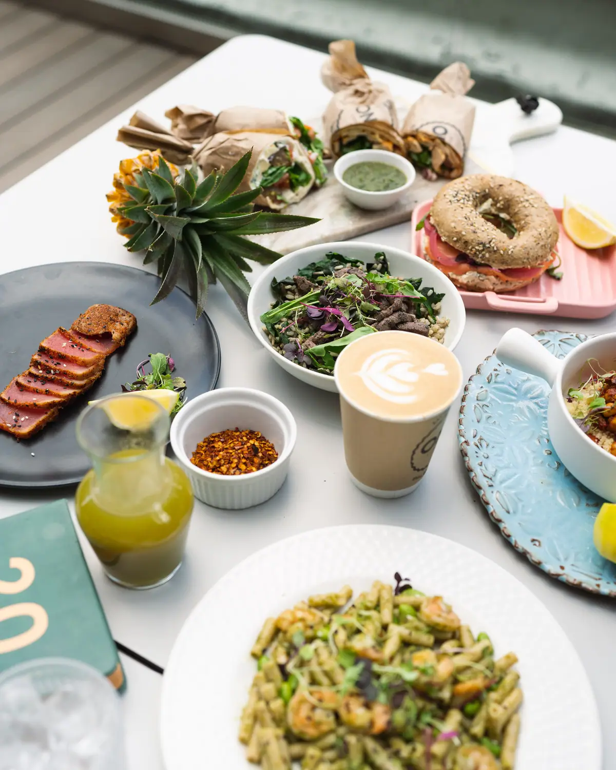 ONO brunch flat-lay with coffee and fresh plates