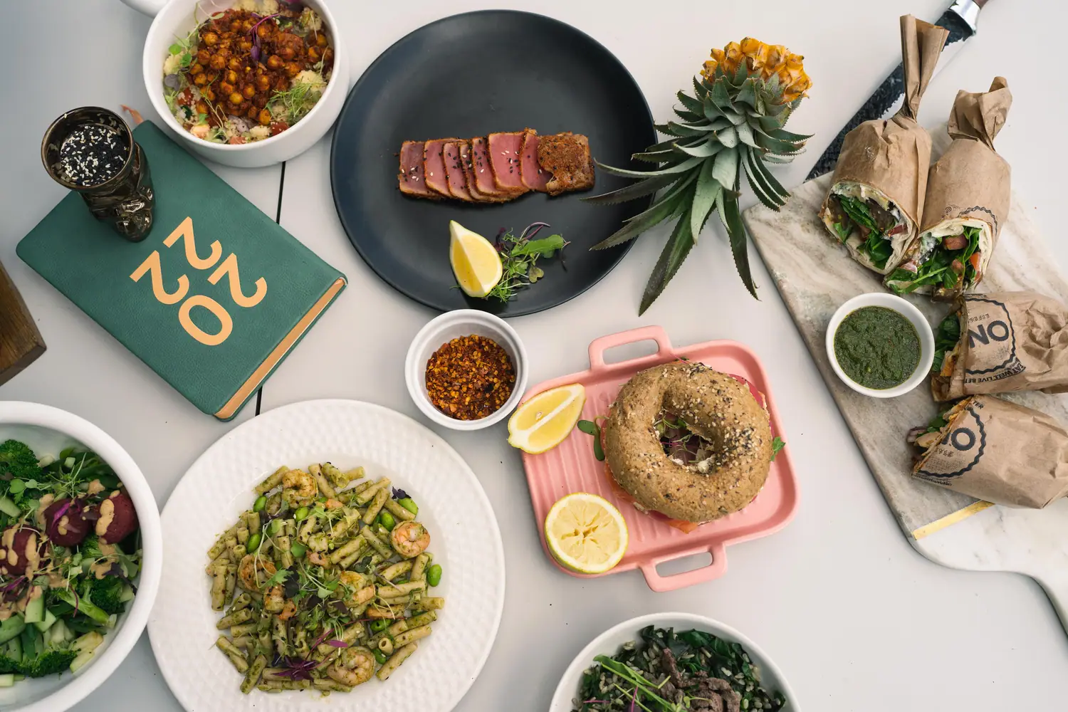 ONO table spread shot from above with branded packaging and fresh plates